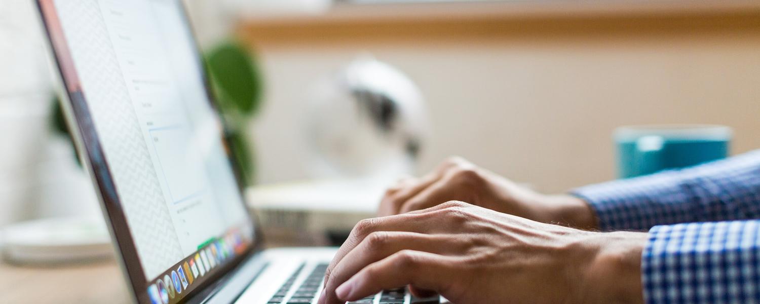 Person typing on a computer